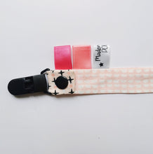 Charger l'image dans la galerie, Les attaches tétines