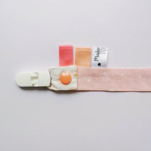 Charger l'image dans la galerie, Les attaches tétines