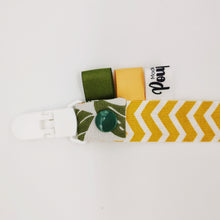 Charger l'image dans la galerie, Les attaches tétines