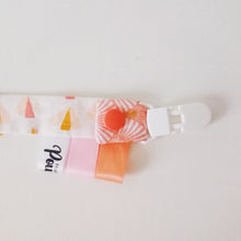 Charger l'image dans la galerie, Les attaches tétines